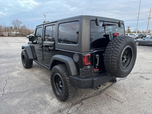 used 2011 Jeep Wrangler Unlimited car, priced at $13,679