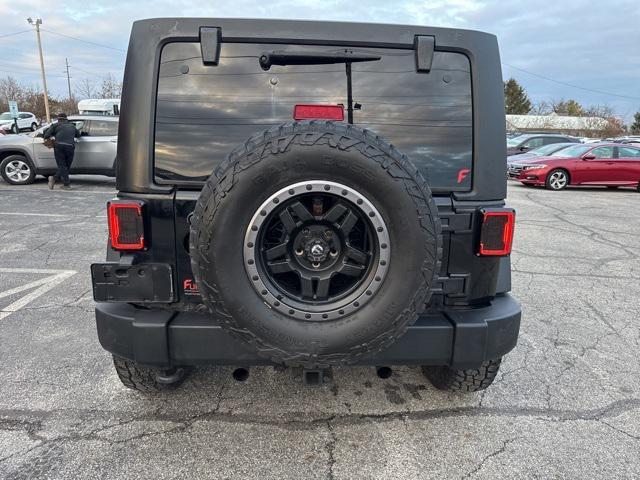 used 2011 Jeep Wrangler Unlimited car, priced at $13,679