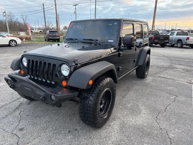 used 2011 Jeep Wrangler Unlimited car, priced at $13,679