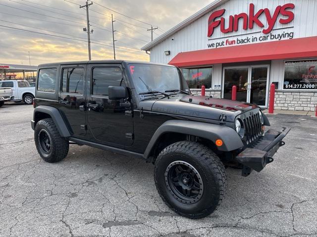 used 2011 Jeep Wrangler Unlimited car, priced at $13,679