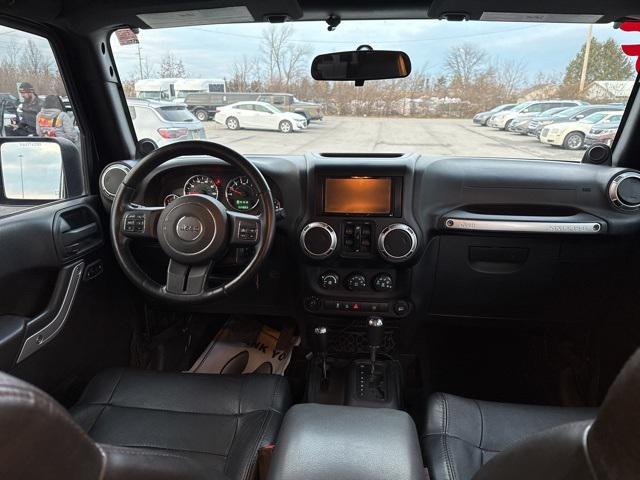 used 2011 Jeep Wrangler Unlimited car, priced at $13,679