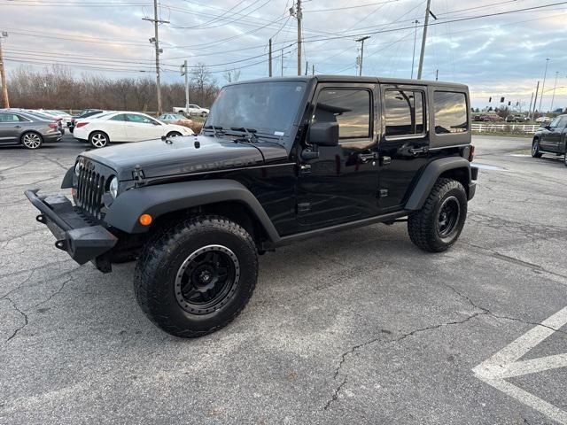 used 2011 Jeep Wrangler Unlimited car, priced at $13,679