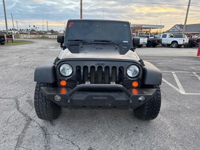 used 2011 Jeep Wrangler Unlimited car, priced at $13,679