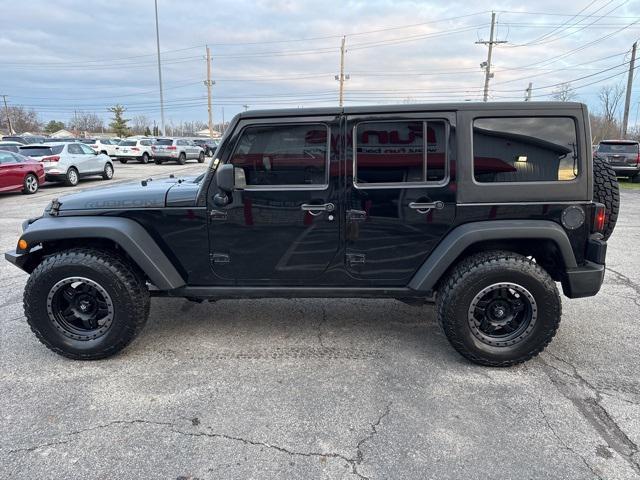 used 2011 Jeep Wrangler Unlimited car, priced at $13,679