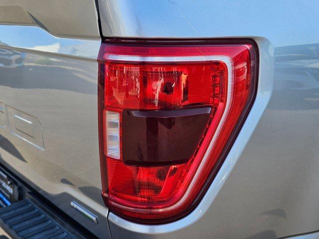 used 2021 Ford F-150 car, priced at $27,000