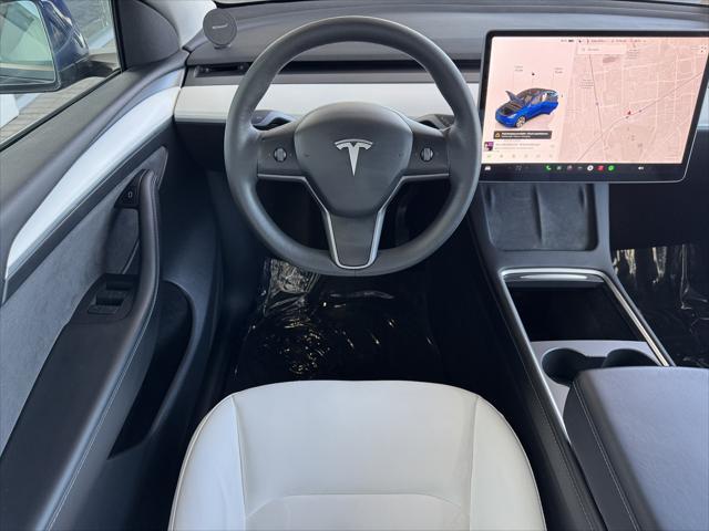 used 2023 Tesla Model Y car, priced at $32,292