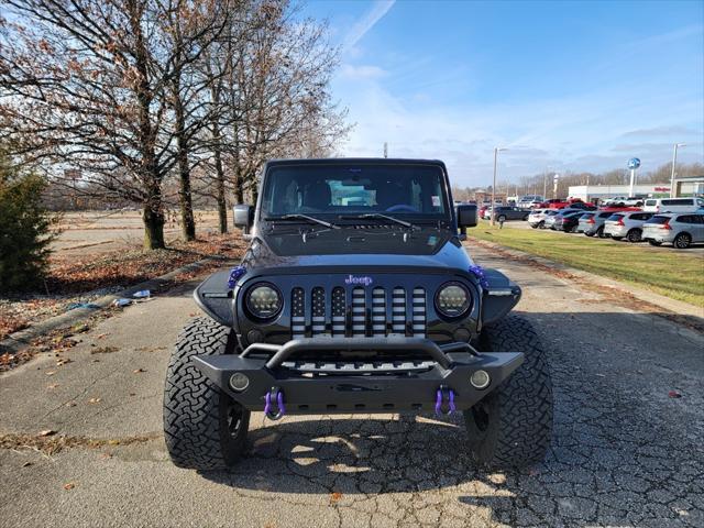 used 2018 Jeep Wrangler JK Unlimited car, priced at $16,988