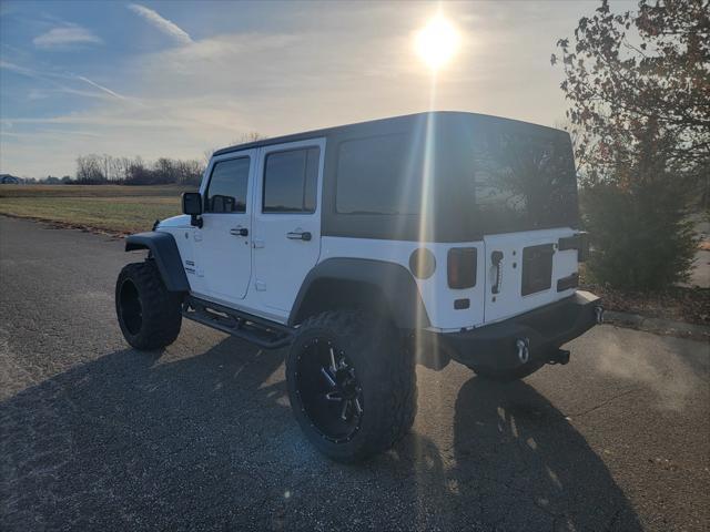 used 2016 Jeep Wrangler Unlimited car, priced at $16,500