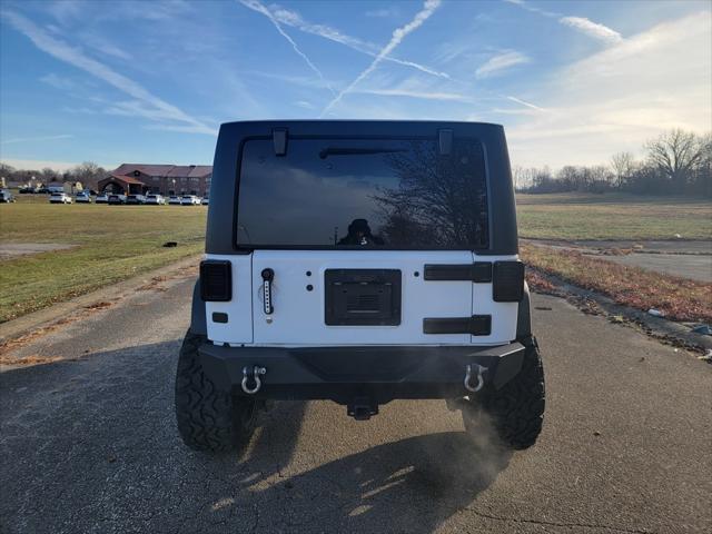 used 2016 Jeep Wrangler Unlimited car, priced at $16,500