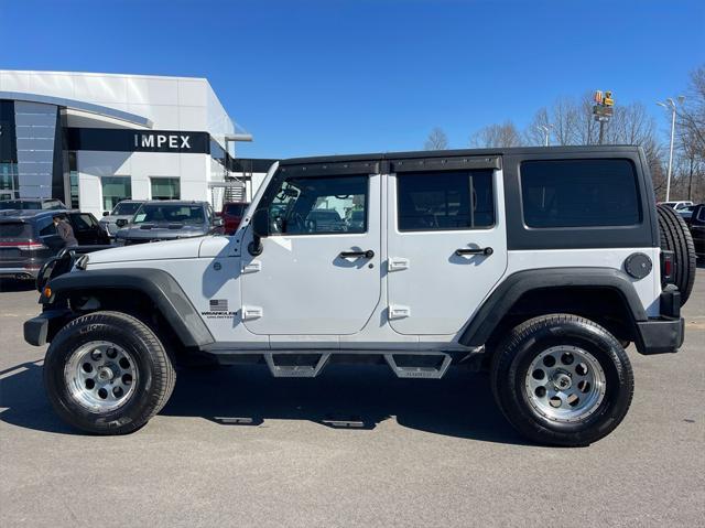 used 2011 Jeep Wrangler Unlimited car, priced at $13,500