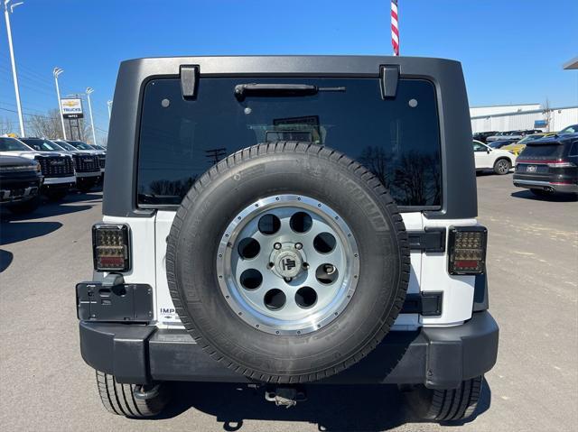 used 2011 Jeep Wrangler Unlimited car, priced at $13,500