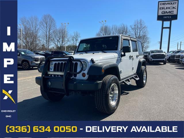 used 2011 Jeep Wrangler Unlimited car, priced at $13,500