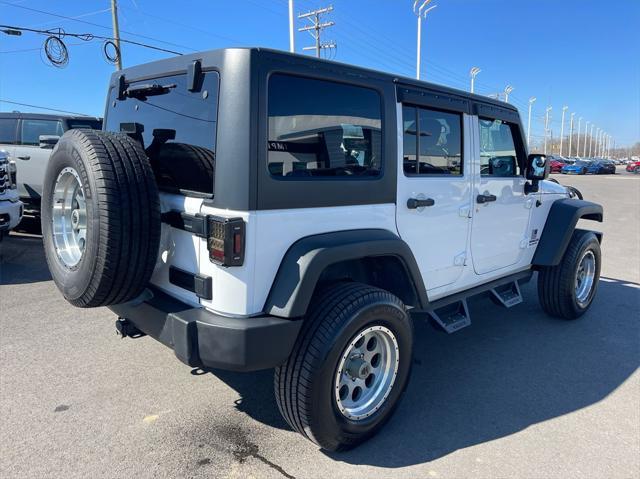 used 2011 Jeep Wrangler Unlimited car, priced at $13,500