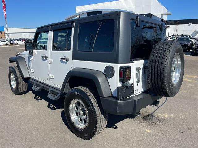 used 2011 Jeep Wrangler Unlimited car, priced at $13,500