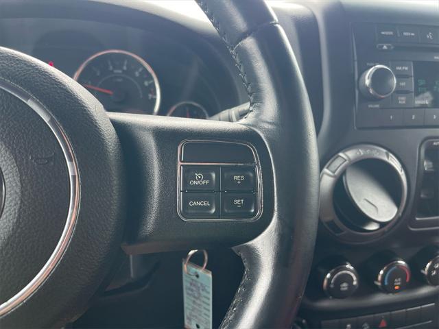 used 2015 Jeep Wrangler Unlimited car, priced at $12,950