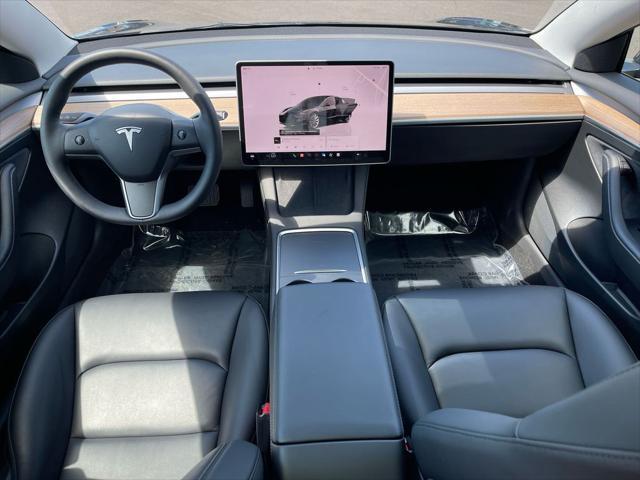 used 2023 Tesla Model 3 car, priced at $31,625