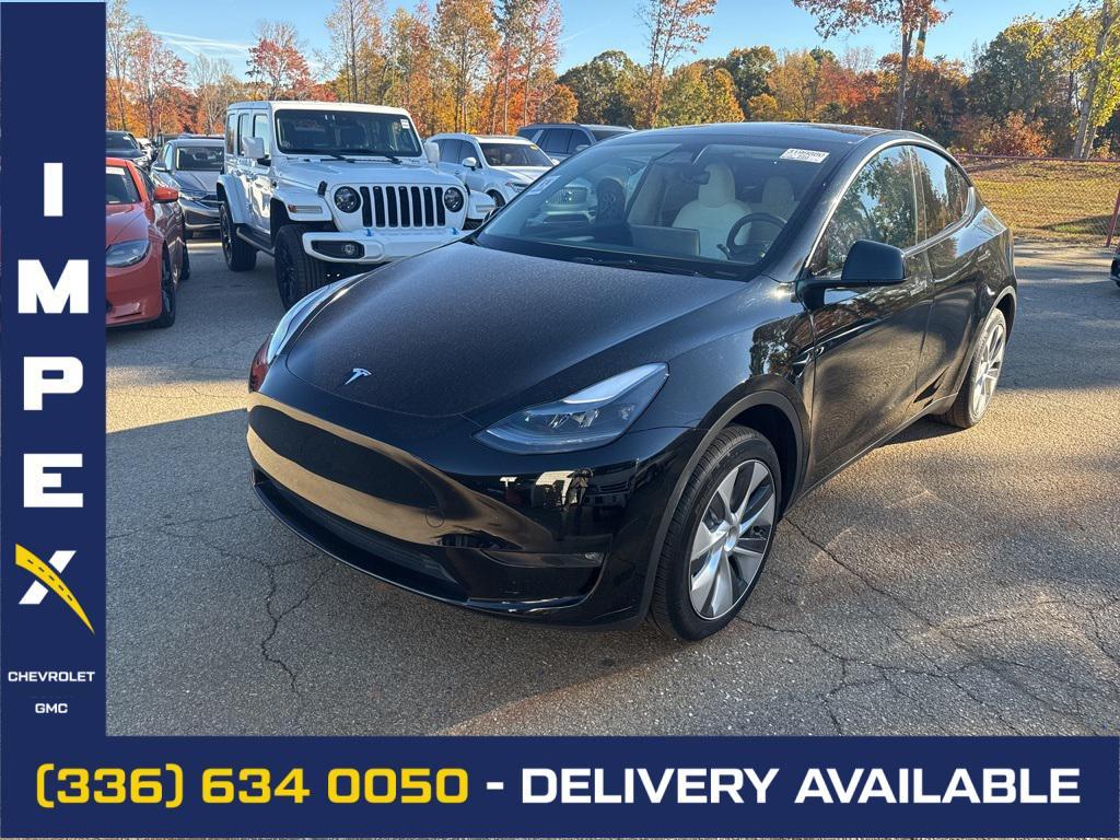used 2023 Tesla Model Y car, priced at $33,990