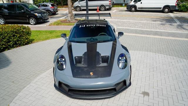used 2023 Porsche 911 car, priced at $409,998