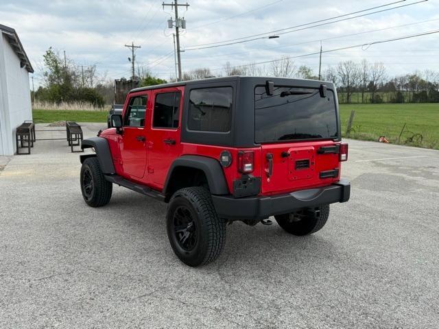 used 2015 Jeep Wrangler Unlimited car, priced at $15,916