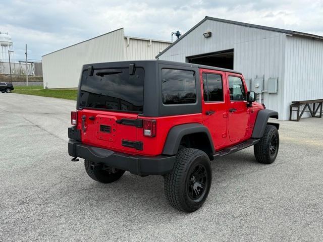 used 2015 Jeep Wrangler Unlimited car, priced at $15,916