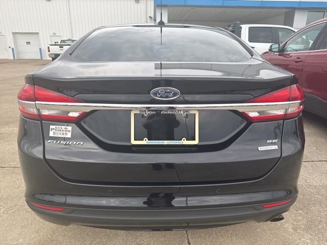used 2018 Ford Fusion car, priced at $13,575