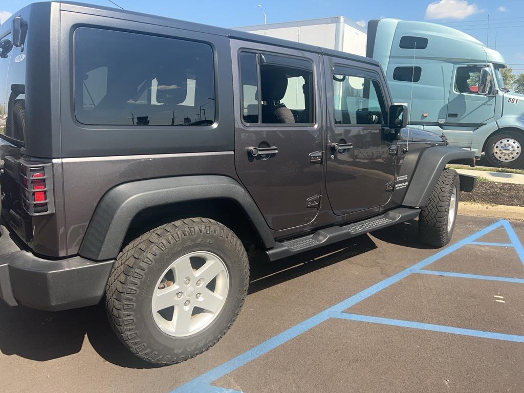 used 2016 Jeep Wrangler Unlimited car, priced at $18,100