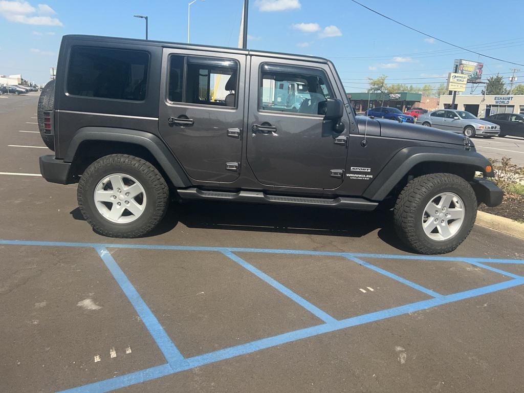 used 2016 Jeep Wrangler Unlimited car, priced at $18,100
