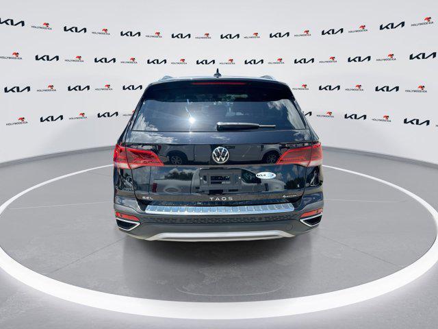 used 2024 Volkswagen Taos car, priced at $27,226