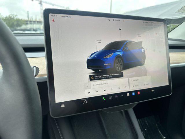 used 2025 Tesla Model Y car, priced at $37,077