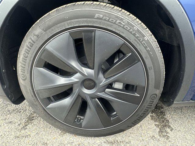 used 2025 Tesla Model Y car, priced at $37,077