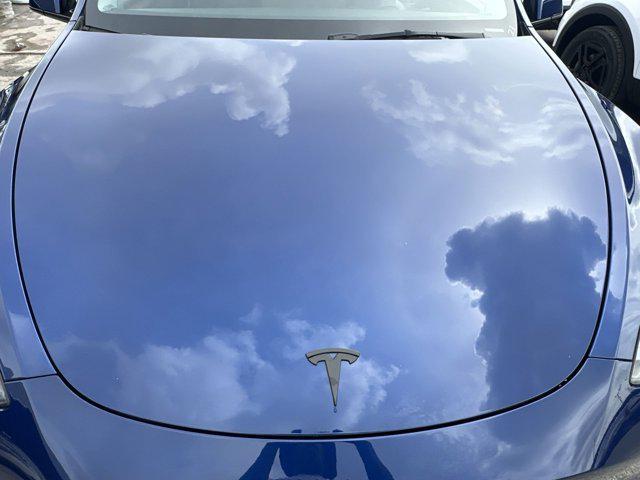 used 2025 Tesla Model Y car, priced at $37,077