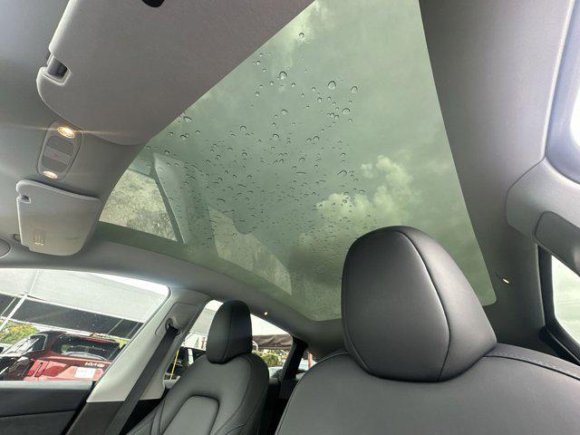 used 2025 Tesla Model Y car, priced at $37,077