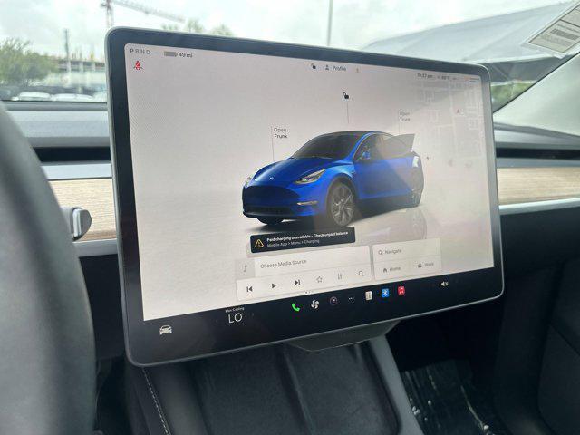 used 2025 Tesla Model Y car, priced at $37,077