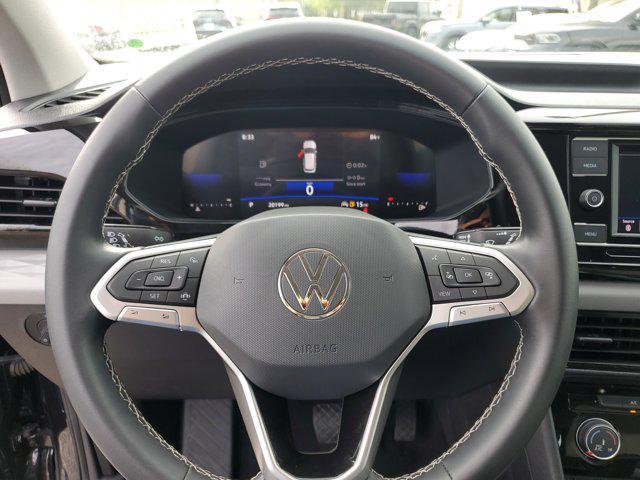 used 2023 Volkswagen Taos car, priced at $18,913