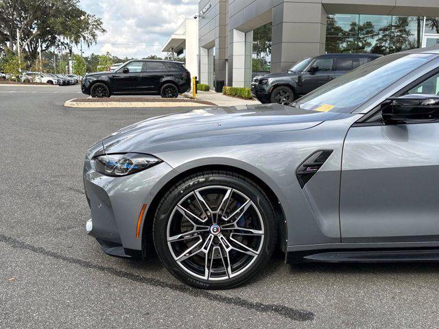 used 2023 BMW M4 car, priced at $77,000