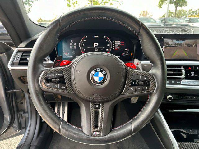 used 2023 BMW M4 car, priced at $77,000