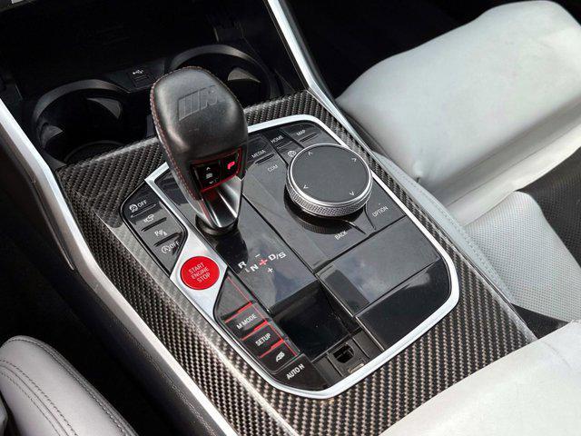 used 2023 BMW M4 car, priced at $77,000