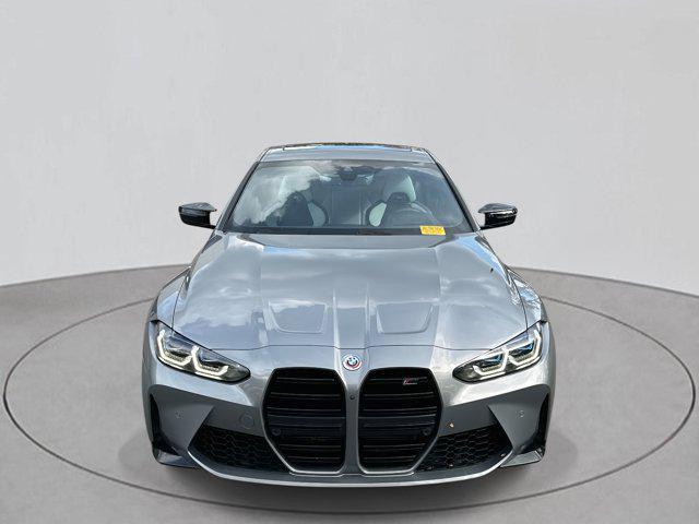 used 2023 BMW M4 car, priced at $77,000