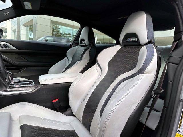used 2023 BMW M4 car, priced at $77,000