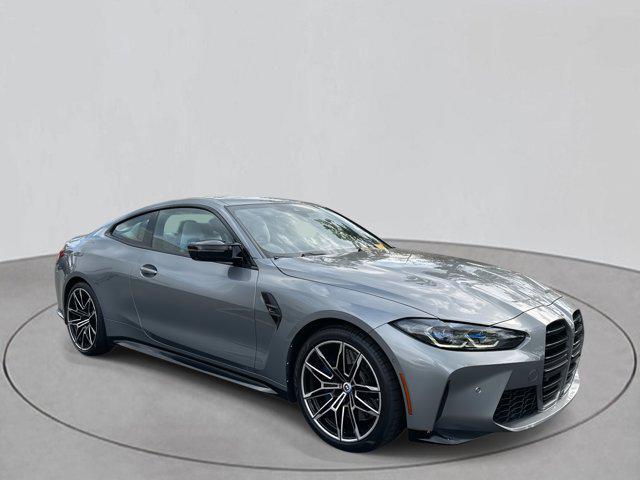 used 2023 BMW M4 car, priced at $77,000