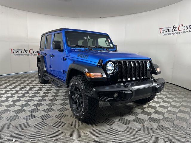 used 2023 Jeep Wrangler car, priced at $32,000