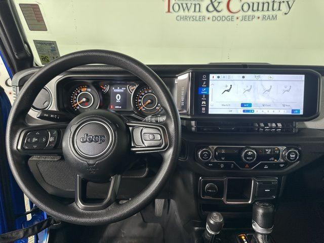 used 2024 Jeep Wrangler car, priced at $30,835
