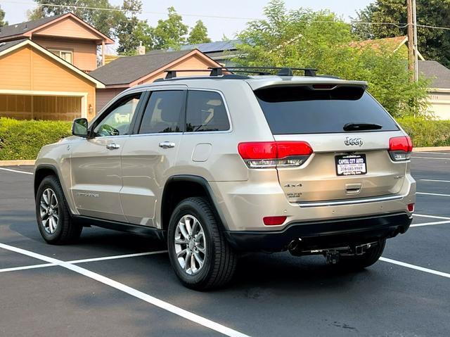 used 2014 Jeep Grand Cherokee car, priced at $13,999