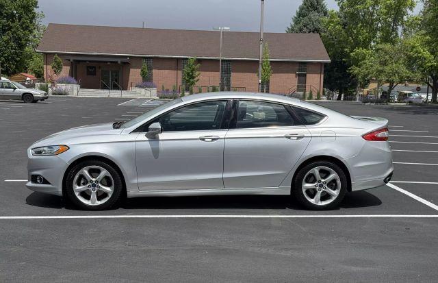 used 2016 Ford Fusion car, priced at $9,999