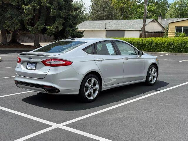 used 2016 Ford Fusion car, priced at $9,999