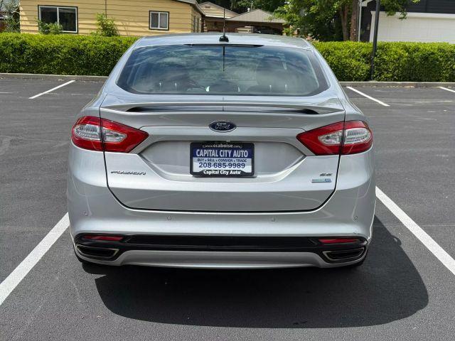 used 2016 Ford Fusion car, priced at $9,999