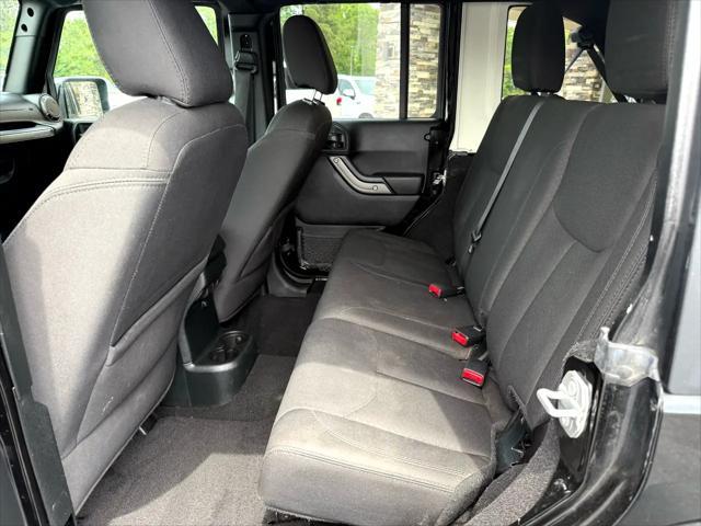 used 2018 Jeep Wrangler JK Unlimited car, priced at $23,999