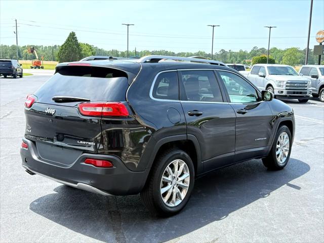 used 2014 Jeep Cherokee car, priced at $13,999
