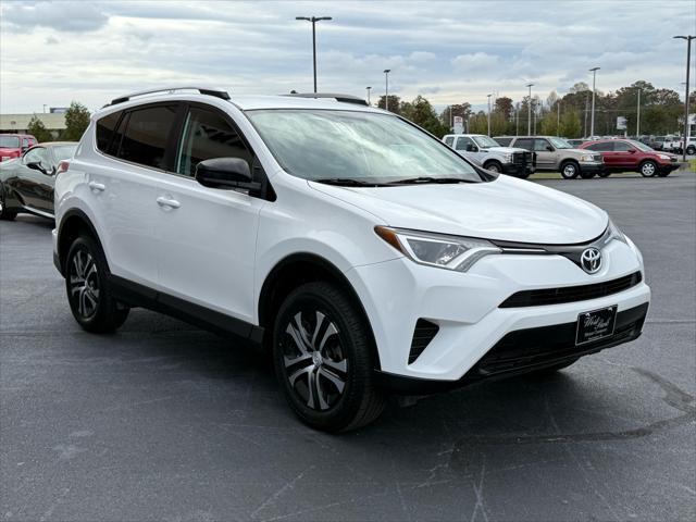 used 2016 Toyota RAV4 car, priced at $13,999