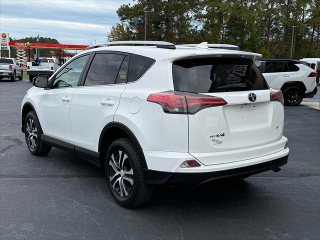 used 2016 Toyota RAV4 car, priced at $13,999